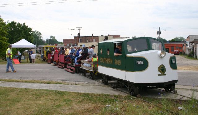 The consist is crossing with Alton Rileys "Southern F unit" as lead power.