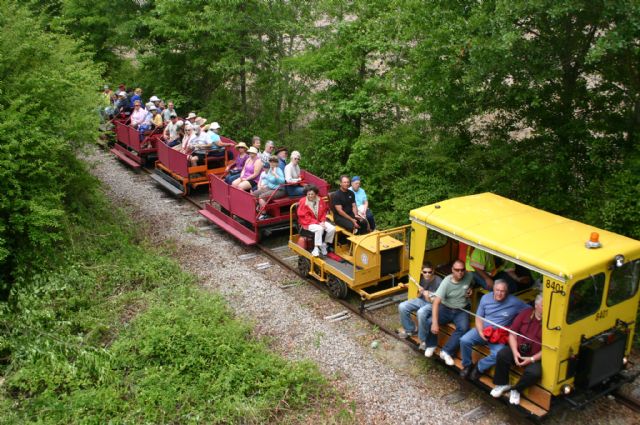 Passengers enjoy the clicky clack on an overcast morning. 