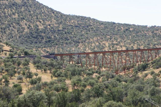 One of the tall trestles located in open country on the way west to Creel.