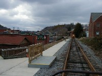 Rolling south through the McCaysville passenger boarding platform.