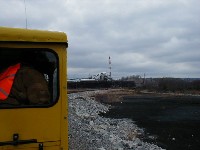 Passing the copper mine in McCaysville. This mine was closed by a strike, resulting in this line losing its traffic.