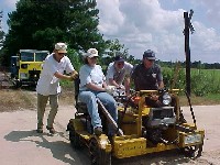 Jim and Pete help Carey get his powerful belt driven car through.