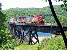 Train riding over bridge